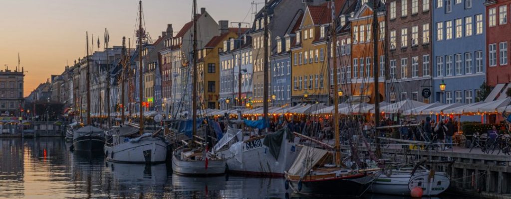 an image of boats in Nyhagen,, Denmark at diusk