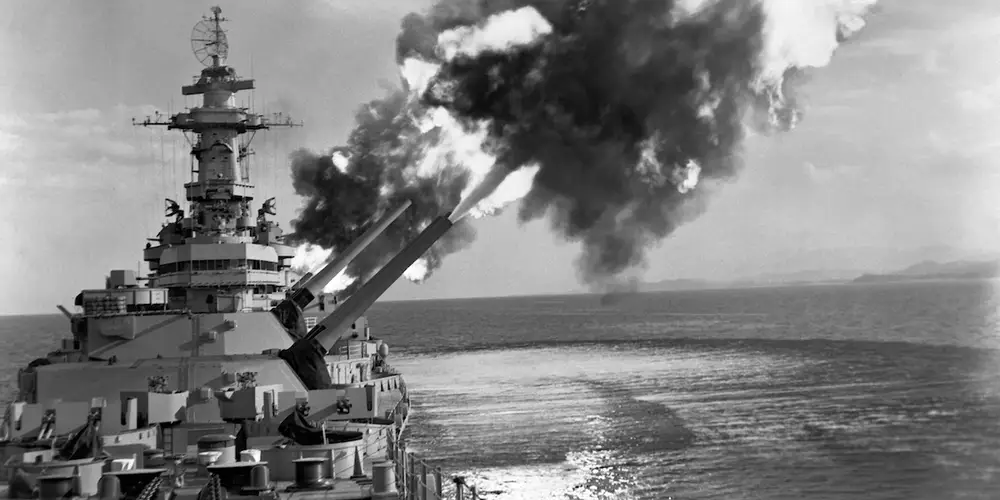 the USS New Jersey firing a broadside