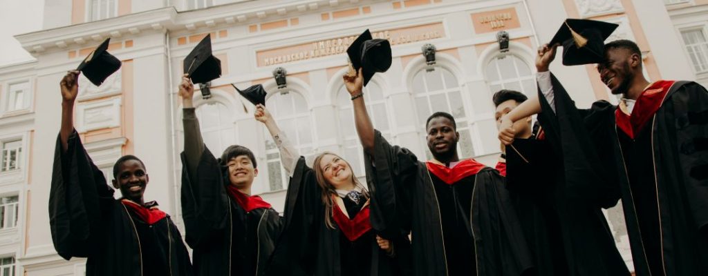 Students in gowns and mortarboards